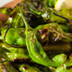 Illustration for article titled (Seinfeld voice) What's the deal with blistered shishito peppers?